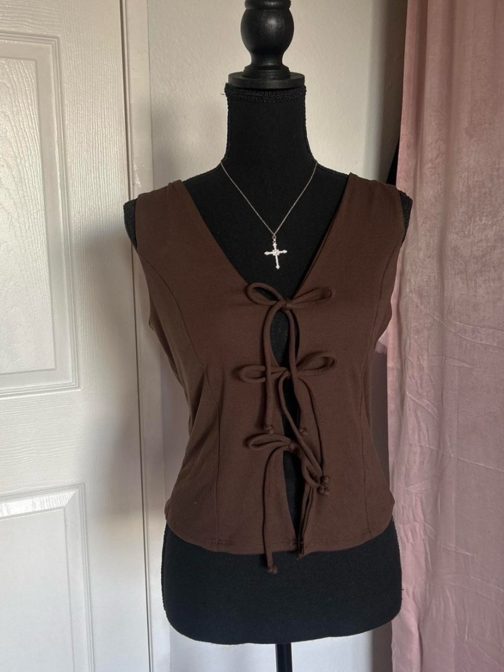Brown lace up top with a cute bow detail